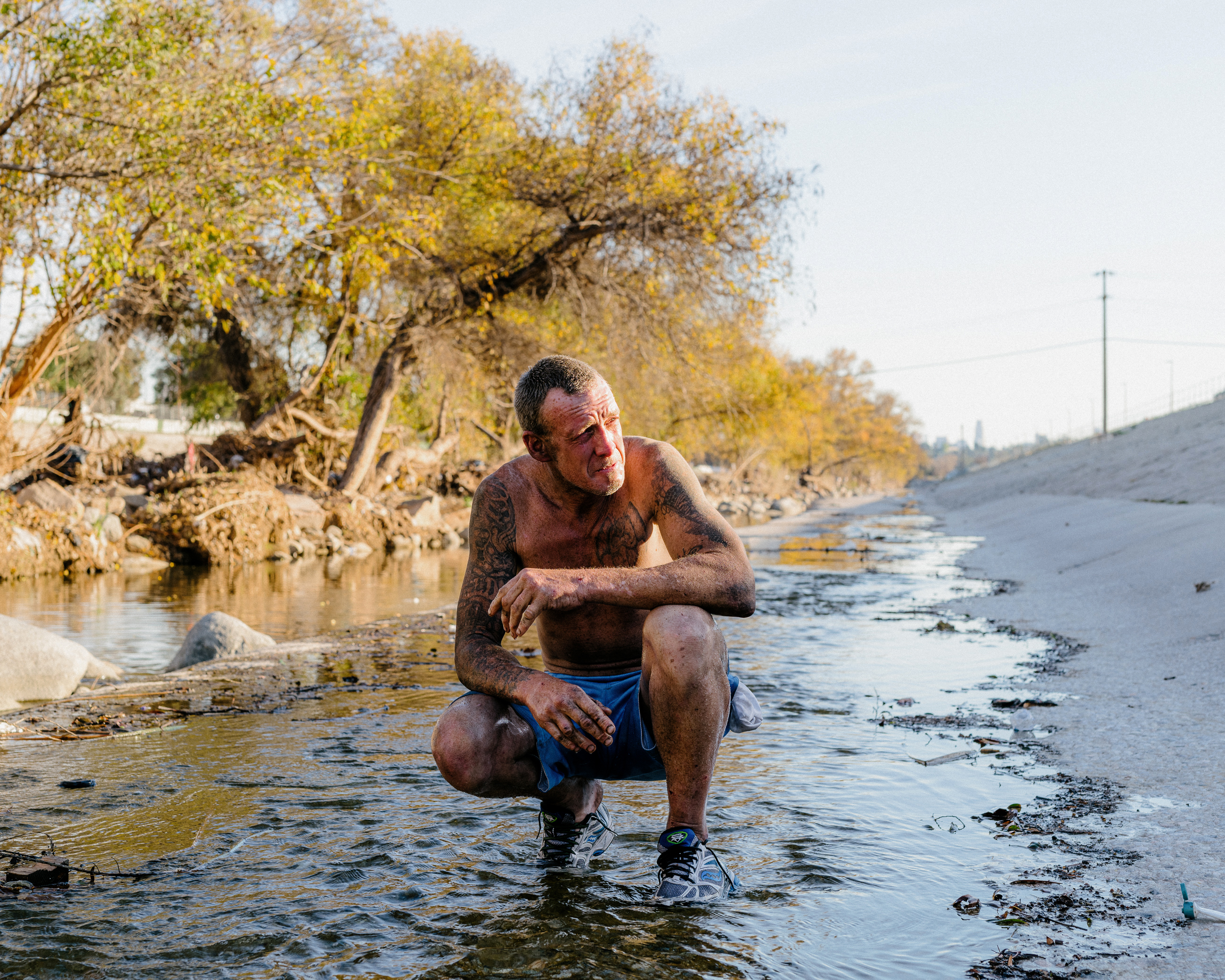 A man bathing in the river - Atwater, 2018
